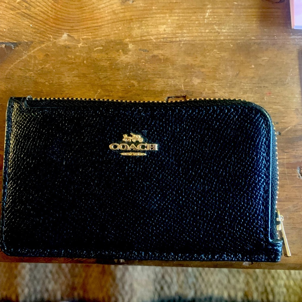 COACH black coin purse.  Never used.  Priced to sell. Someone should be using it
